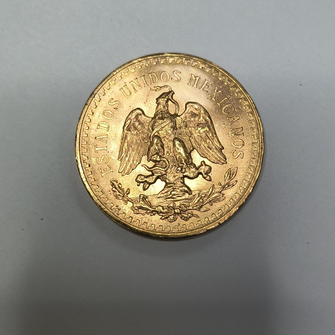 K1 41,60 GRMS - DTO. 0,00 GRMS - 21 K - AVALÚO 76003,20 * IDENTIFICACIÓN  MONEDA NOMINATIVA * MATERIALES  ORO * ESPECI (SEMINUEVO)