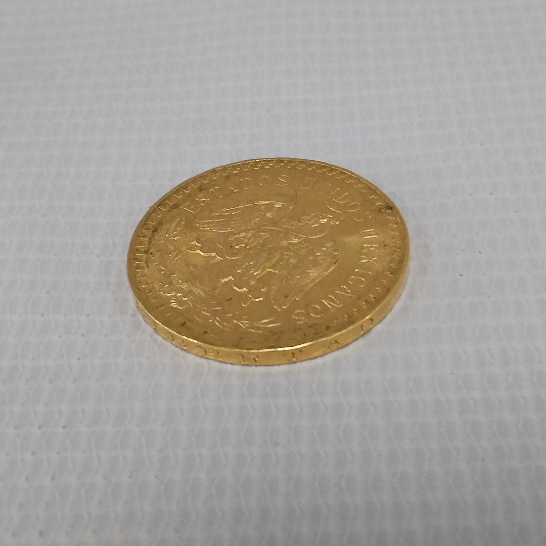 K1 41.6 GRMS - DESC. 0 GRAMOS - 21 K - AVALÚO 74131.2 * * IDENTIFICACIÓN MONEDA NOMINATIVA. * MONEDAS PESOS 50 PESO (SEMINUEVO)