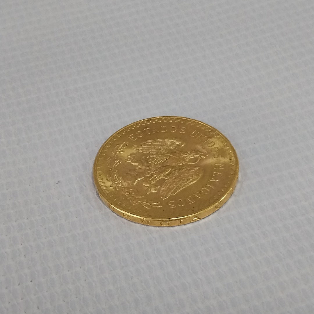 K1 41,60 GRMS - DTO. 0,00 GRMS - 21 K - AVALÚO 76003,20 * IDENTIFICACIÓN MONEDA NOMINATIVA * MONEDAS PESOS 50 PESOS (SEMINUEVO)