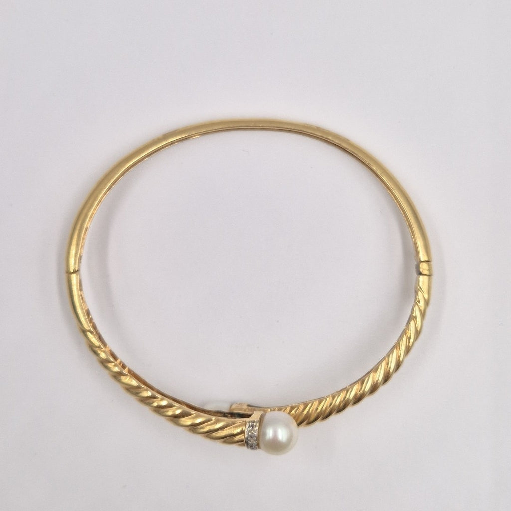 PULSERA RIGIDA. ORO. 10 K 16.9 GRMS (SEMINUEVO)