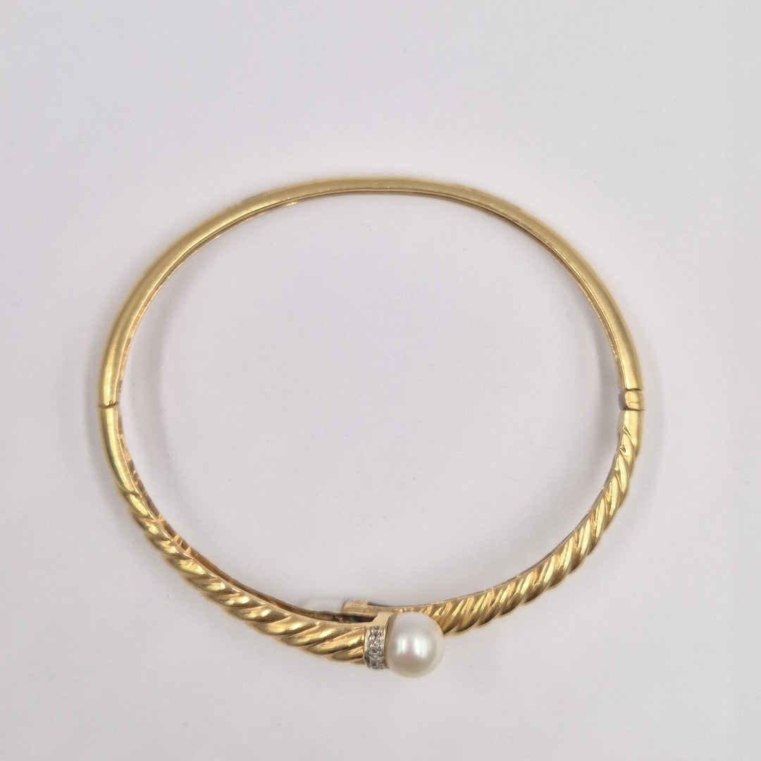 PULSERA RIGIDA. ORO. 10 K 16.9 GRMS (SEMINUEVO)