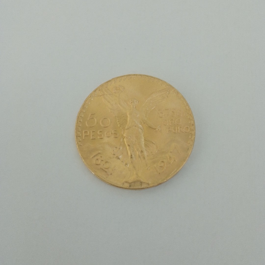 K1 41,60 GRMS - DTO. 0,00 GRMS - 21 K - AVALÚO 77126,40 * IDENTIFICACIÓN MONEDA NOMINATIVA * MONEDAS PESOS 50 PESOS (SEMINUEVO)