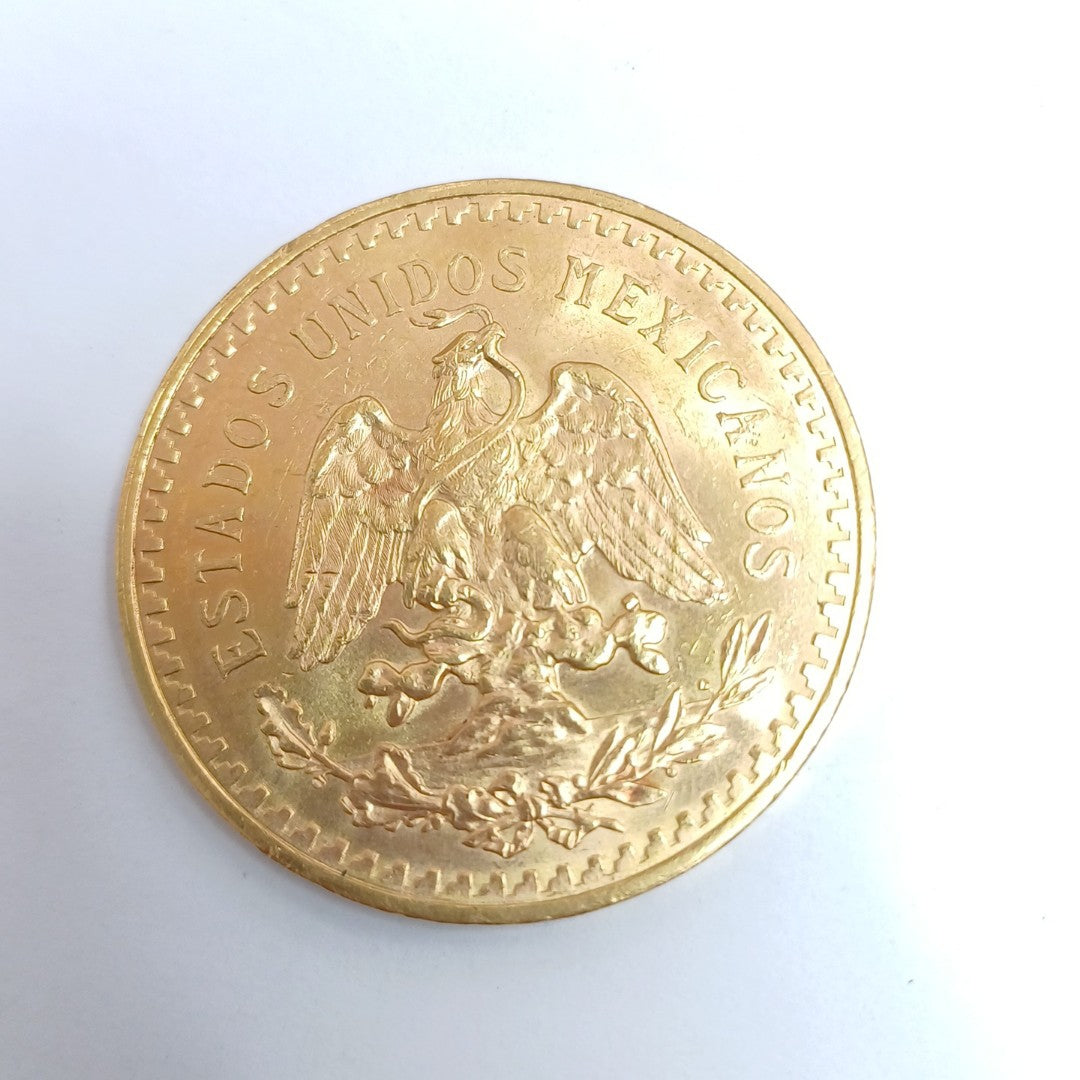 K1 41.6 GRMS - DESC. 0 GRAMOS - 21 K - AVALÚO 77688 * * IDENTIFICACIÓN MONEDA NOMINATIVA. * MONEDAS PESOS 50 PESOS. (SEMINUEVO)