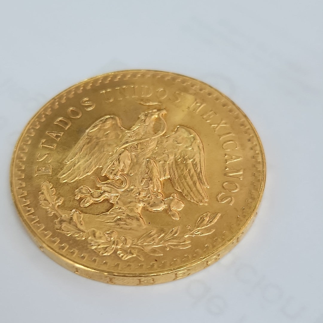 K1 41.6 GRMS - DESC. 0 GRAMOS - 21 K - AVALÚO 76377.6 * * IDENTIFICACIÓN MONEDA NOMINATIVA. * MONEDAS PESOS 50 PESO (SEMINUEVO)