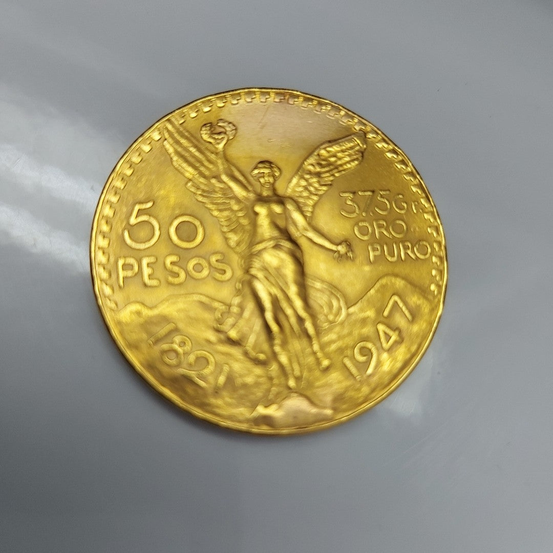K1 41,60 GRMS - DTO. 0,00 GRMS - 21 K - AVALÚO 76003,20 * IDENTIFICACIÓN MONEDA NOMINATIVA * MONEDAS PESOS 50 PESOS (SEMINUEVO)
