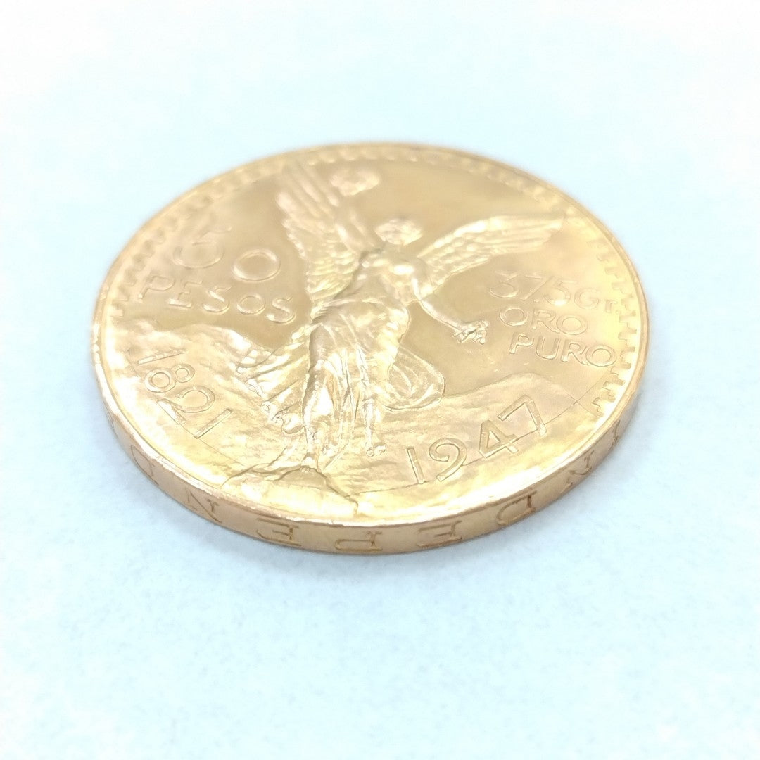 K1 41.6 GRMS - DESC. 0 GRAMOS - 21 K - AVALÚO 76377.6 * * IDENTIFICACIÓN MONEDA NOMINATIVA. * MONEDAS PESOS 50 PESO (SEMINUEVO)