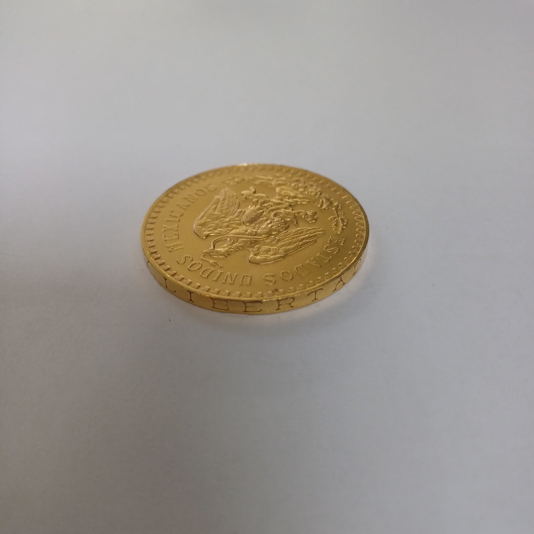 K1 41.6 GRMS - DESC. 0 GRAMOS - 21 K - AVALÚO 71884.8 * * IDENTIFICACIÓN MONEDA NOMINATIVA. * MONEDAS PESOS 50 PESO (SEMINUEVO)