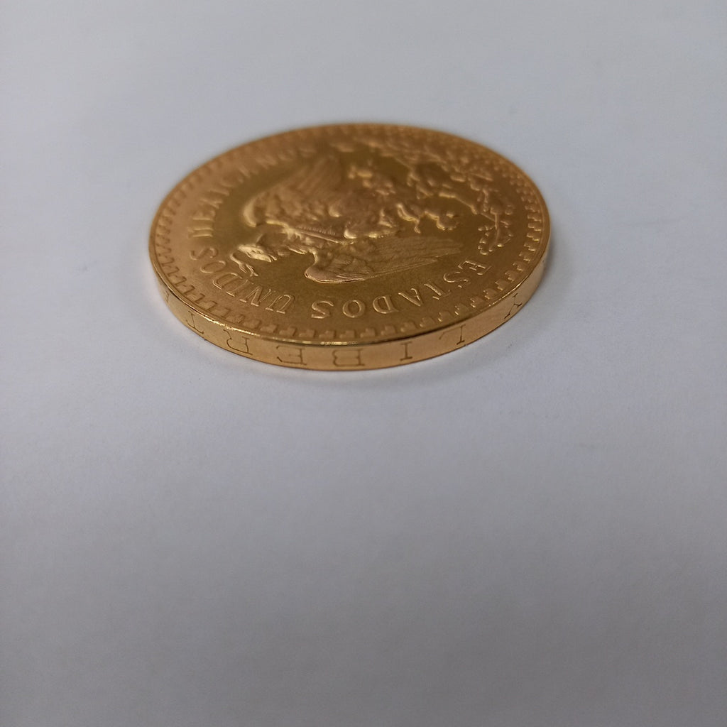K1 41.6 GRMS - DESC. 0 GRAMOS - 21 K - AVALÚO 71884.8 * * IDENTIFICACIÓN MONEDA NOMINATIVA. * MONEDAS PESOS 50 PESO (SEMINUEVO)