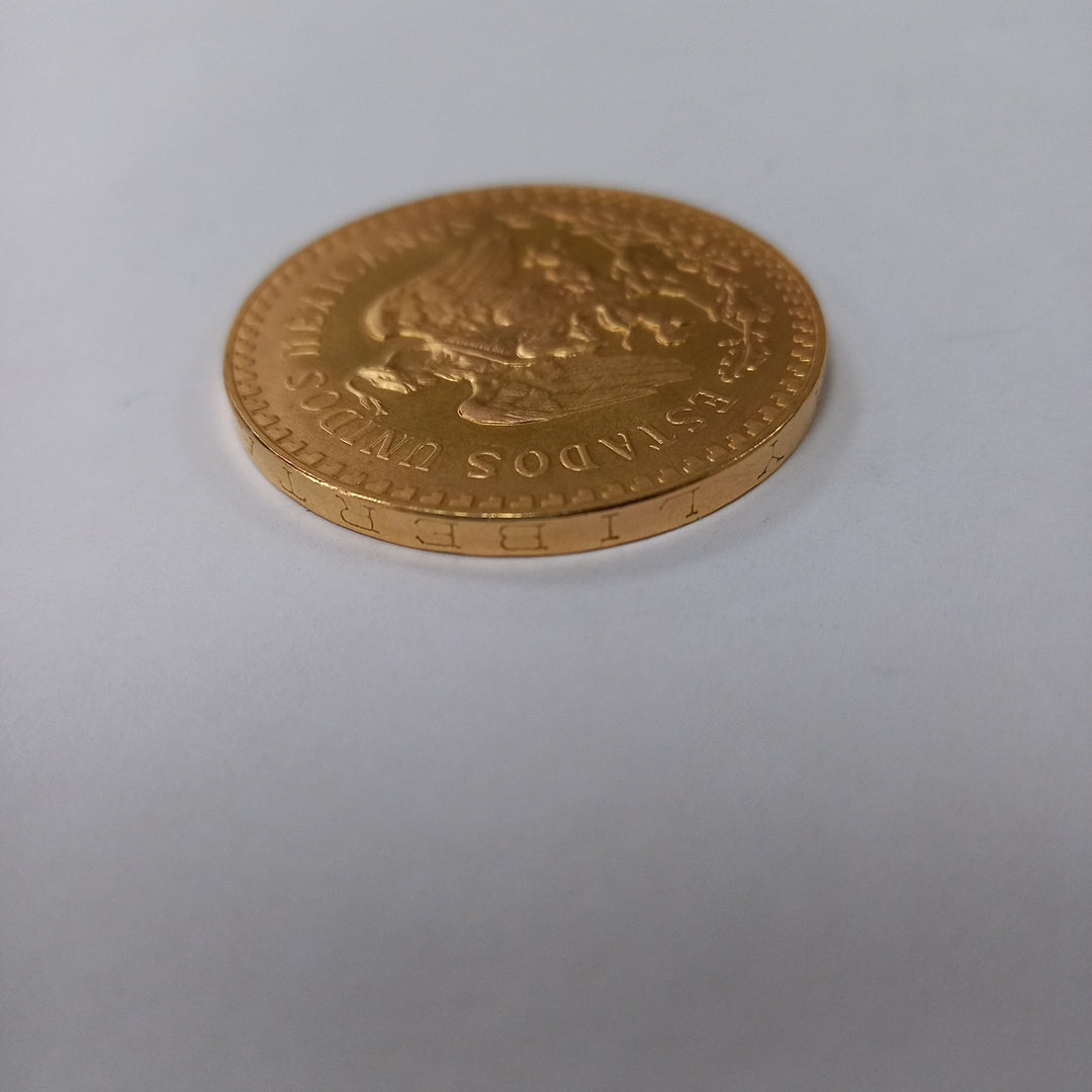 K1 41.6 GRMS - DESC. 0 GRAMOS - 21 K - AVALÚO 71884.8 * * IDENTIFICACIÓN MONEDA NOMINATIVA. * MONEDAS PESOS 50 PESO (SEMINUEVO)