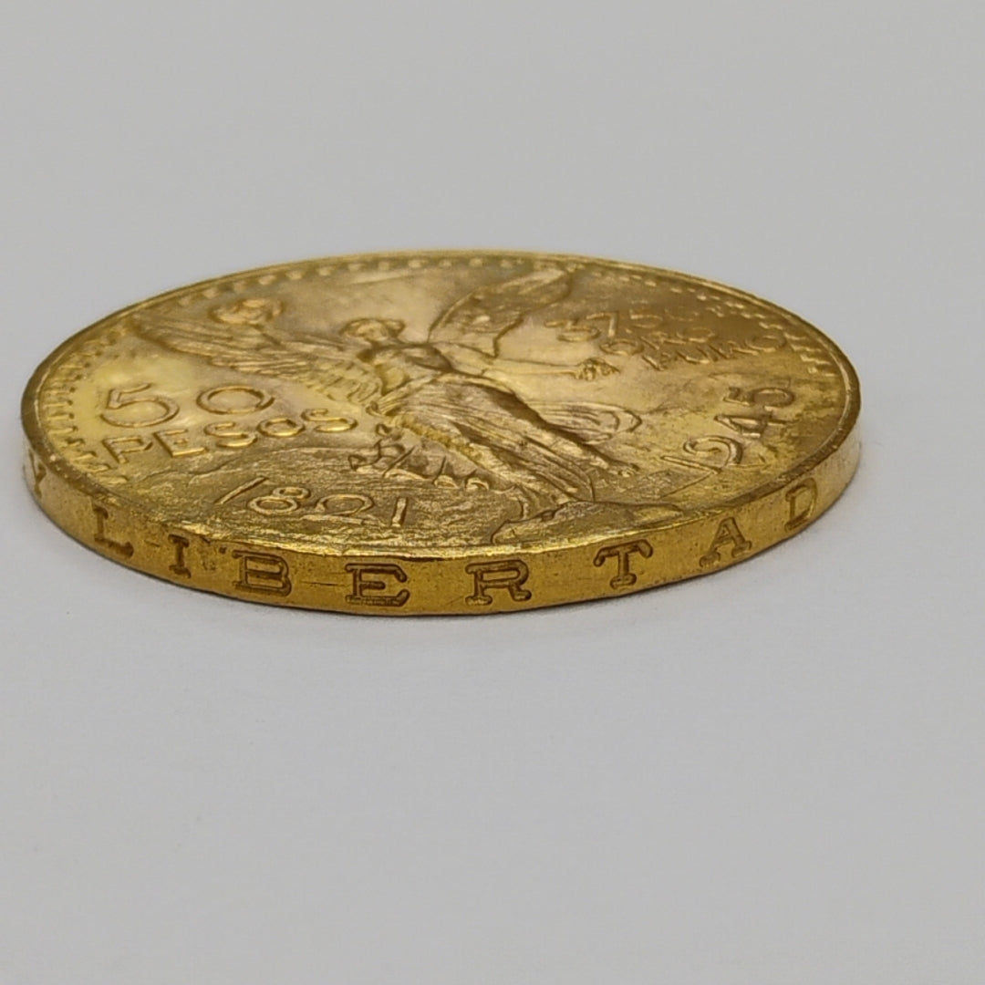 K1 41,60 GRMS - DTO. 0,00 GRMS - 21 K - AVALÚO 79534,21 * IDENTIFICACIÓN MONEDA NOMINATIVA * MONEDAS PESOS 50 PESOS (SEMINUEVO)