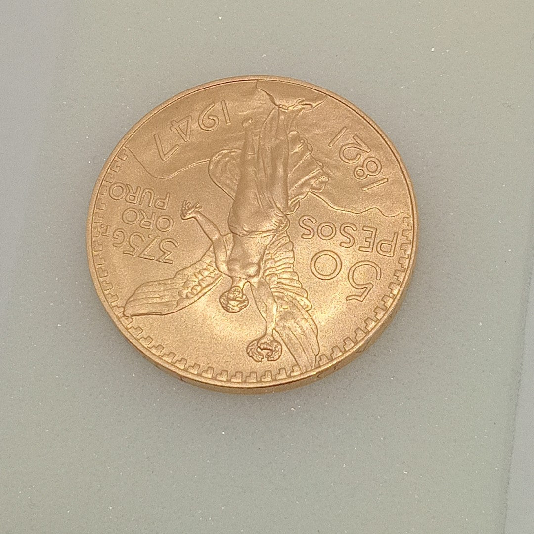 K1 41,60 GRMS - DTO. 0,00 GRMS - 21 K - AVALÚO 79534,21 * IDENTIFICACIÓN MONEDA NOMINATIVA * MONEDAS PESOS 50 PESOS (SEMINUEVO)