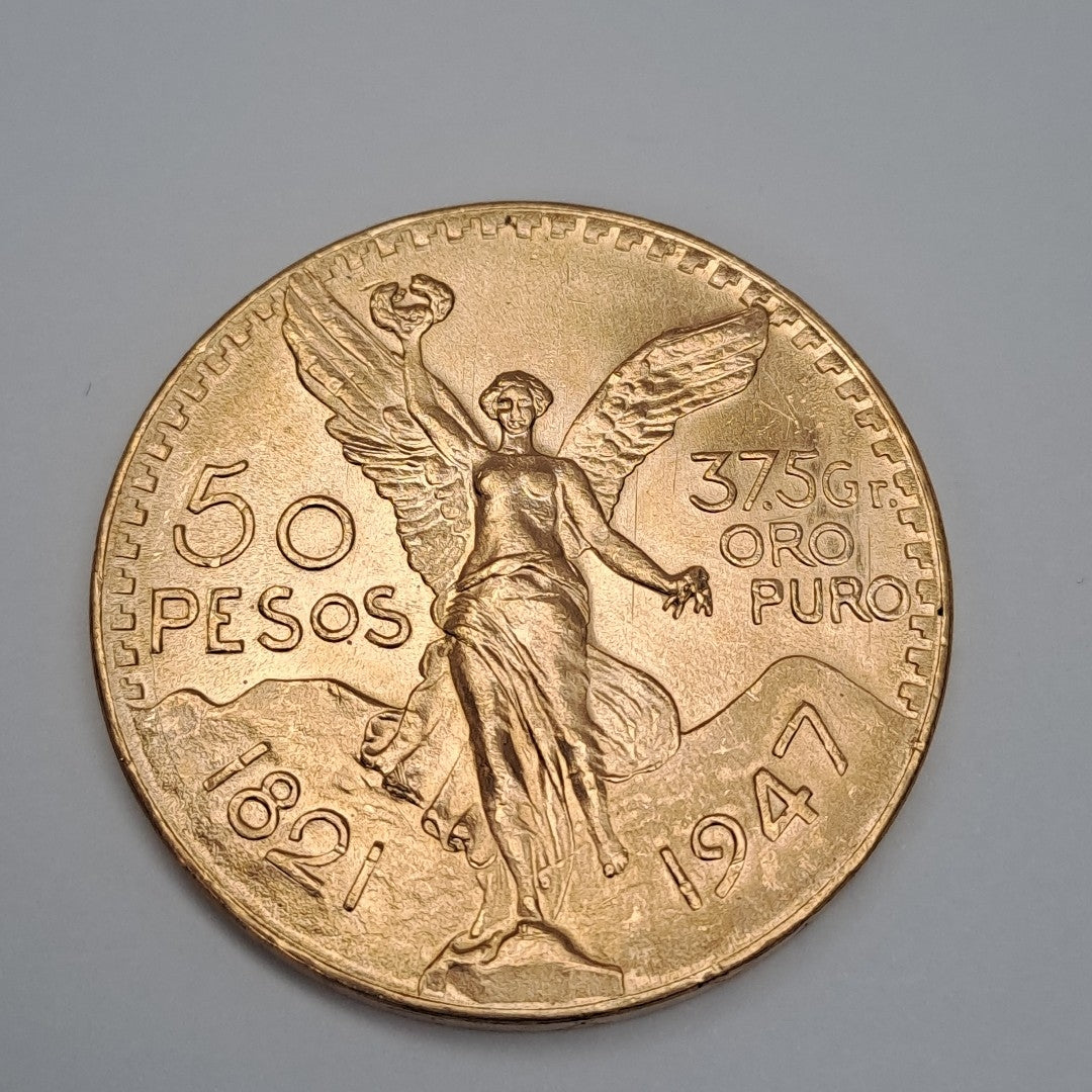 K1 41,50 GRMS - DTO. 0,00 GRMS - 21 K - AVALÚO 79343,02 * IDENTIFICACIÓN MONEDA NOMINATIVA * MONEDAS PESOS 50 PESOS (SEMINUEVO)