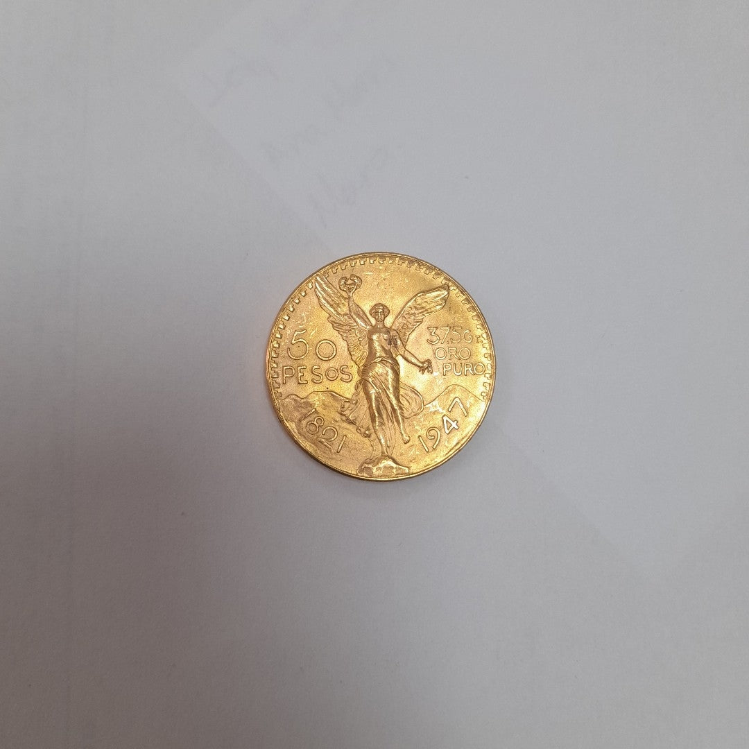 K1 41,60 GRMS - DTO. 0,00 GRMS - 21 K - AVALÚO 79534,21 * IDENTIFICACIÓN MONEDA NOMINATIVA * MONEDAS PESOS 50 PESOS (SEMINUEVO)
