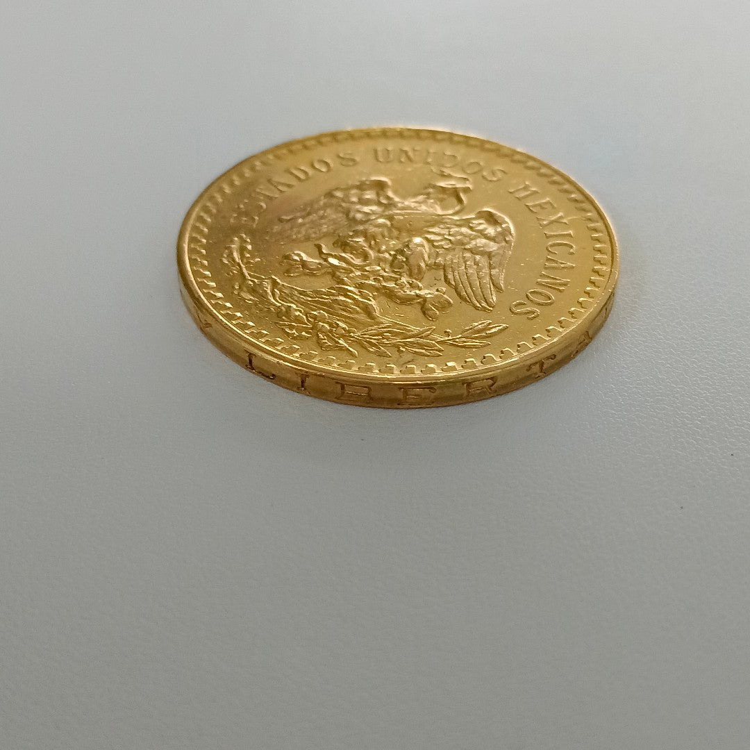 K1 41,60 GRMS - DTO. 0,00 GRMS - 21 K - AVALÚO 79534,21 * IDENTIFICACIÓN MONEDA NOMINATIVA * MONEDAS PESOS 50 PESOS (SEMINUEVO)