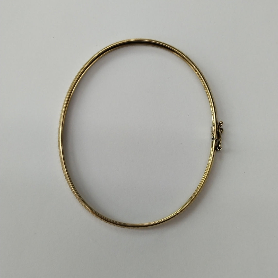 PULSERA RIGIDA. ORO. 10 K 3.8 GRMS (SEMINUEVO)