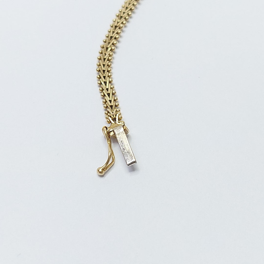 PULSERA. ORO COMBINADO. 14 K 7.9 GRMS (SEMINUEVO)