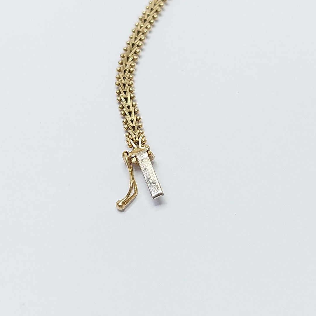 PULSERA. ORO COMBINADO. 14 K 7.9 GRMS (SEMINUEVO)