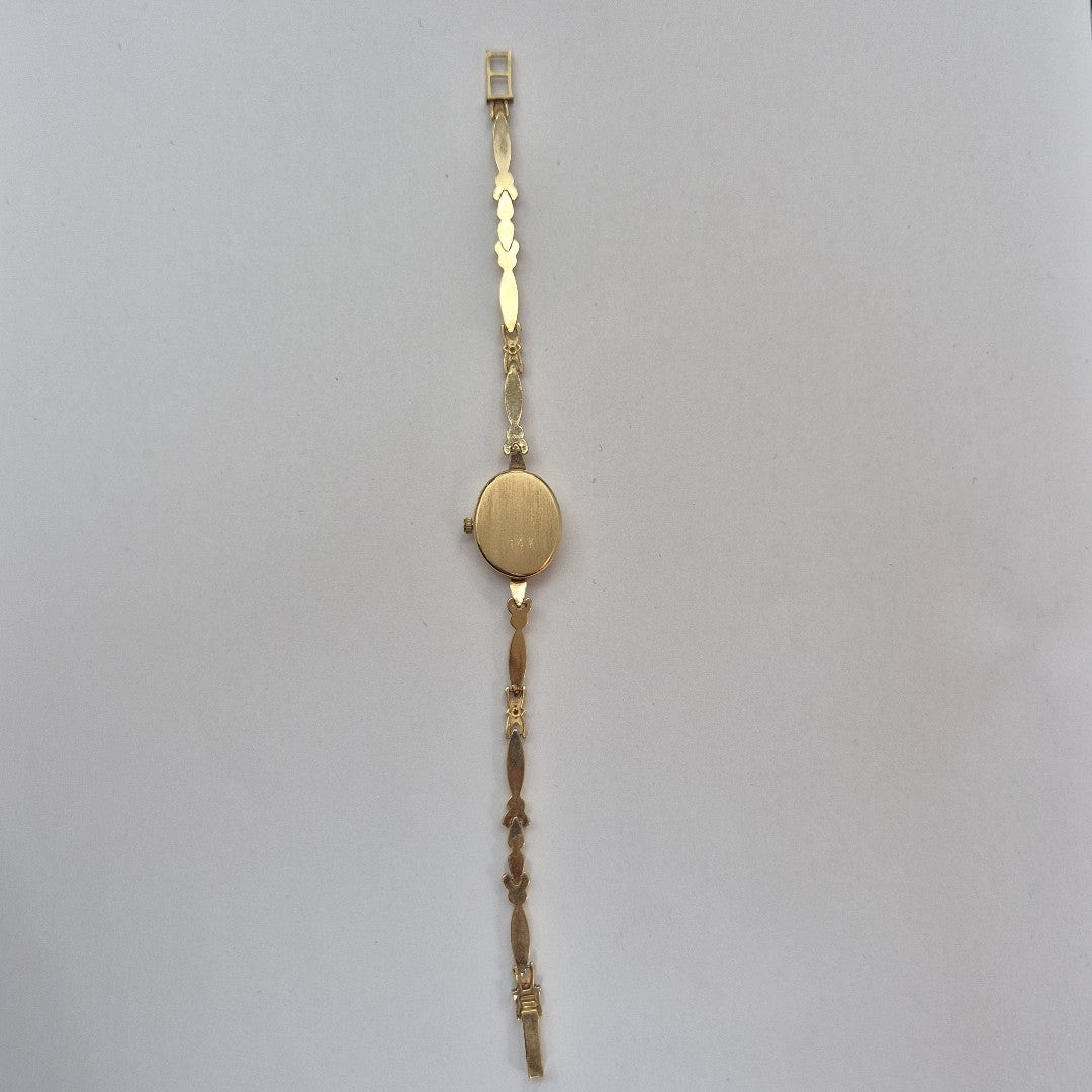 RELOJ CAJA Y PULSO ORO. ORO. 14 K 13.9 GRMS (SEMINUEVO)