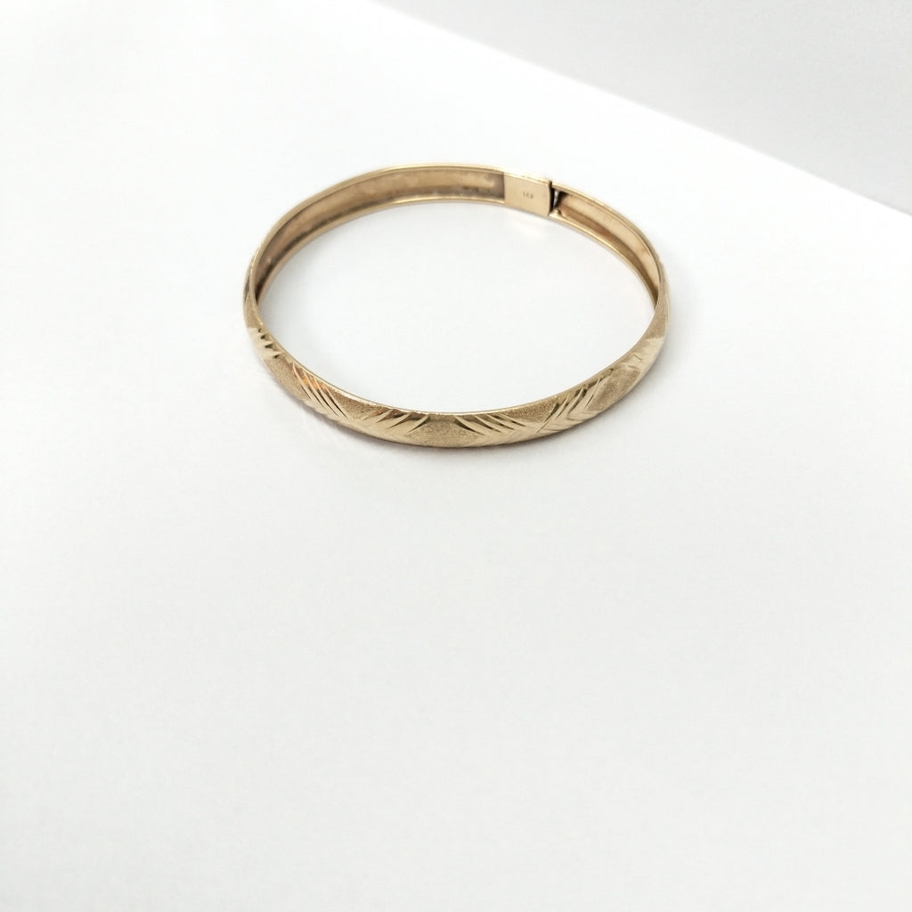 PULSERA RIGIDA. ORO. 14 K 5.8 GRMS (SEMINUEVO)