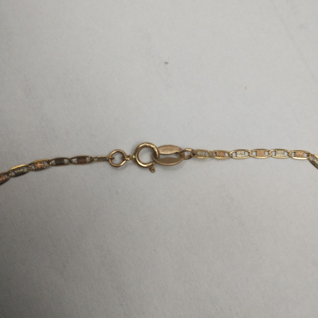 CADENA, DIJE. ORO COMBINADO. 10 K 2.1 GRMS (SEMINUEVO)