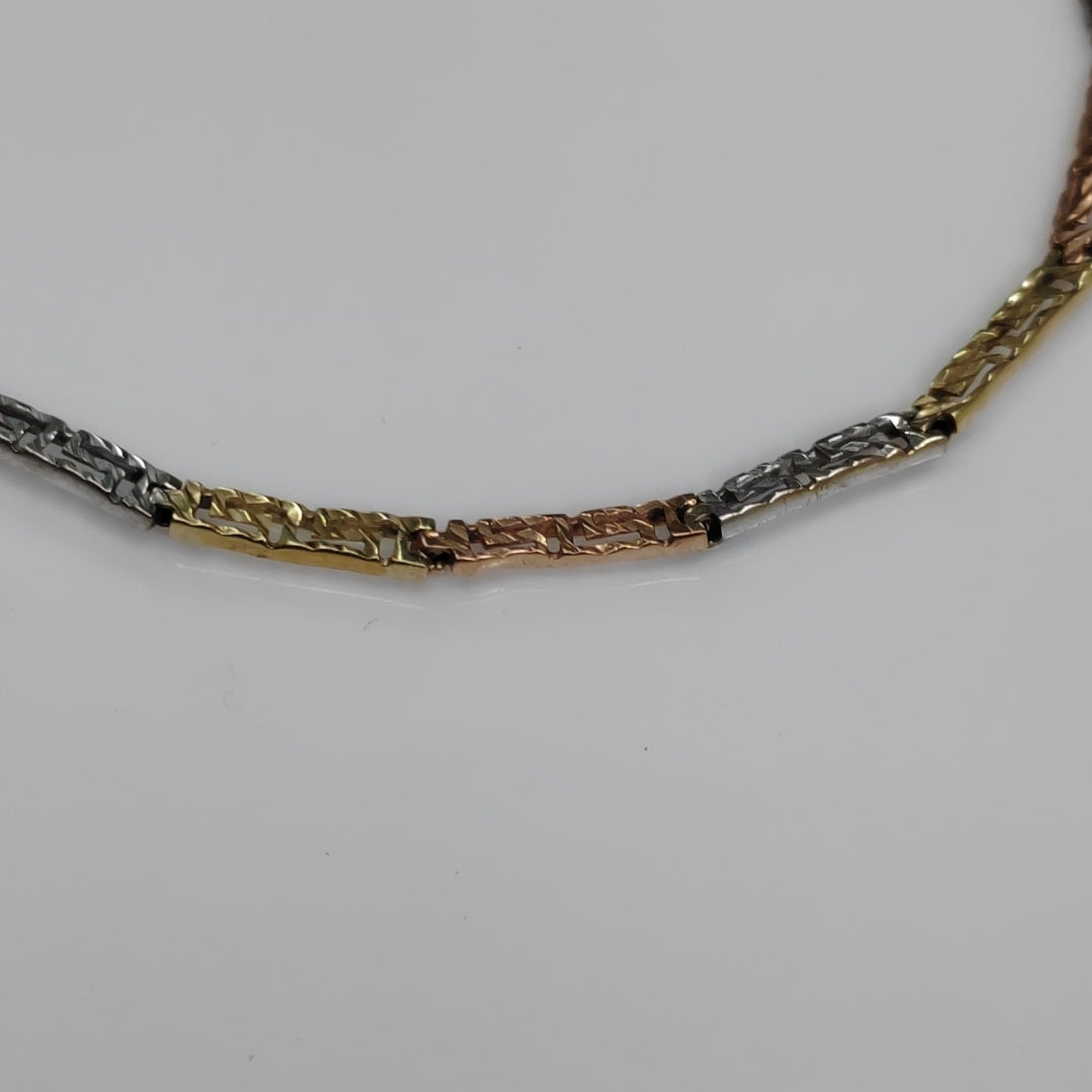 PULSERA. ORO COMBINADO. 14 K 3.7 GRMS (SEMINUEVO)