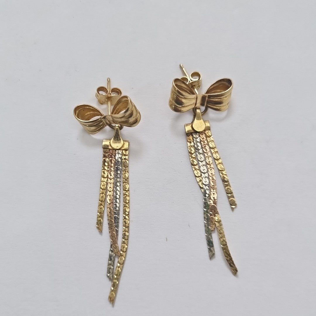 ARETES PAR. ORO, ORO COMBINADO. 14 K 2.9 GRMS (SEMINUEVO)