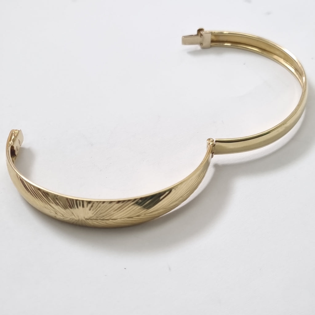 PULSERA RIGIDA. ORO. 14 K 8.6 GRMS (SEMINUEVO)
