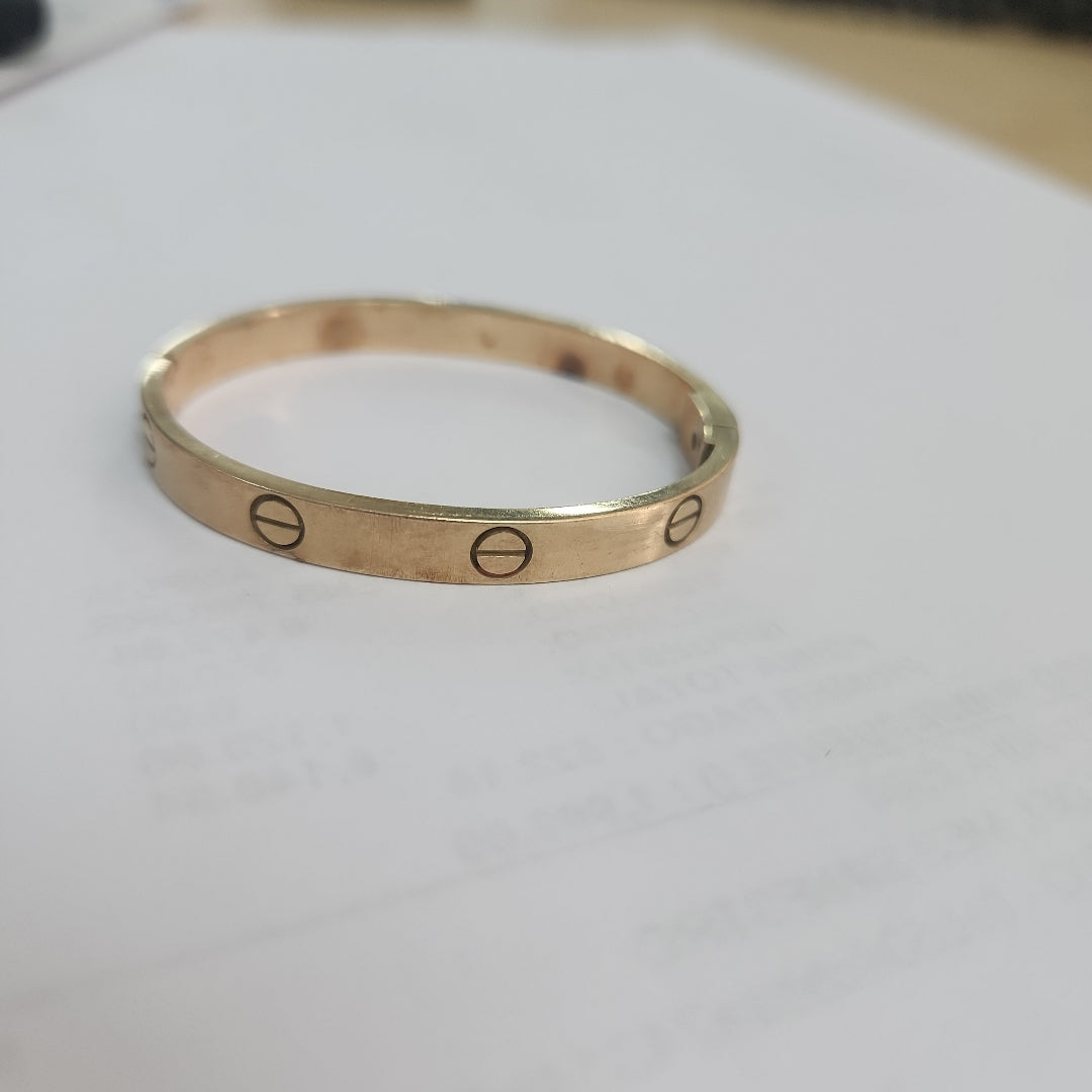 PULSERA RIGIDA. ORO. 14 K 19.6 GRMS (SEMINUEVO)