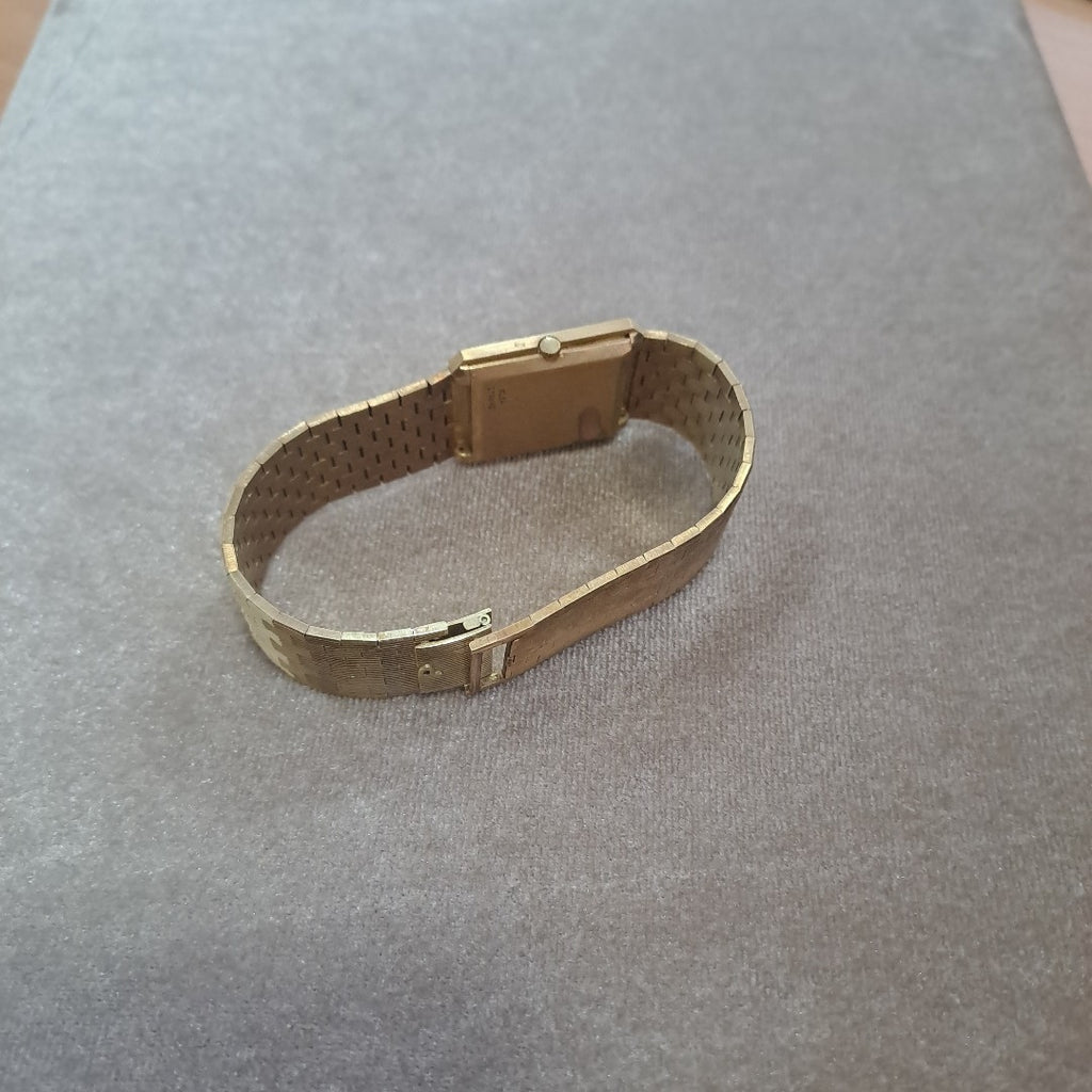 RELOJ CAJA Y PULSO ORO. ORO. 18 K 68.6 GRMS (SEMINUEVO)