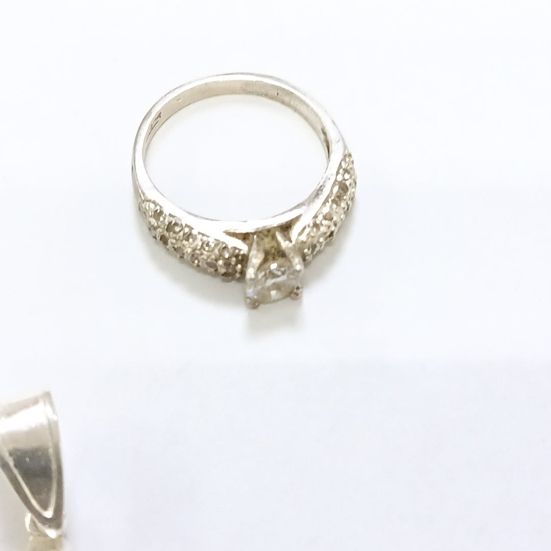 ANILLITO, CRUZ, ESCLAVA, SOLITARIO. PLATA. 17.2 GRMS (SEMINUEVO)