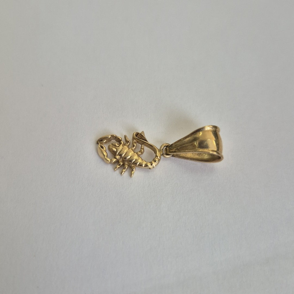 DIJE. ORO. 10 K 0.9 GRMS (SEMINUEVO)