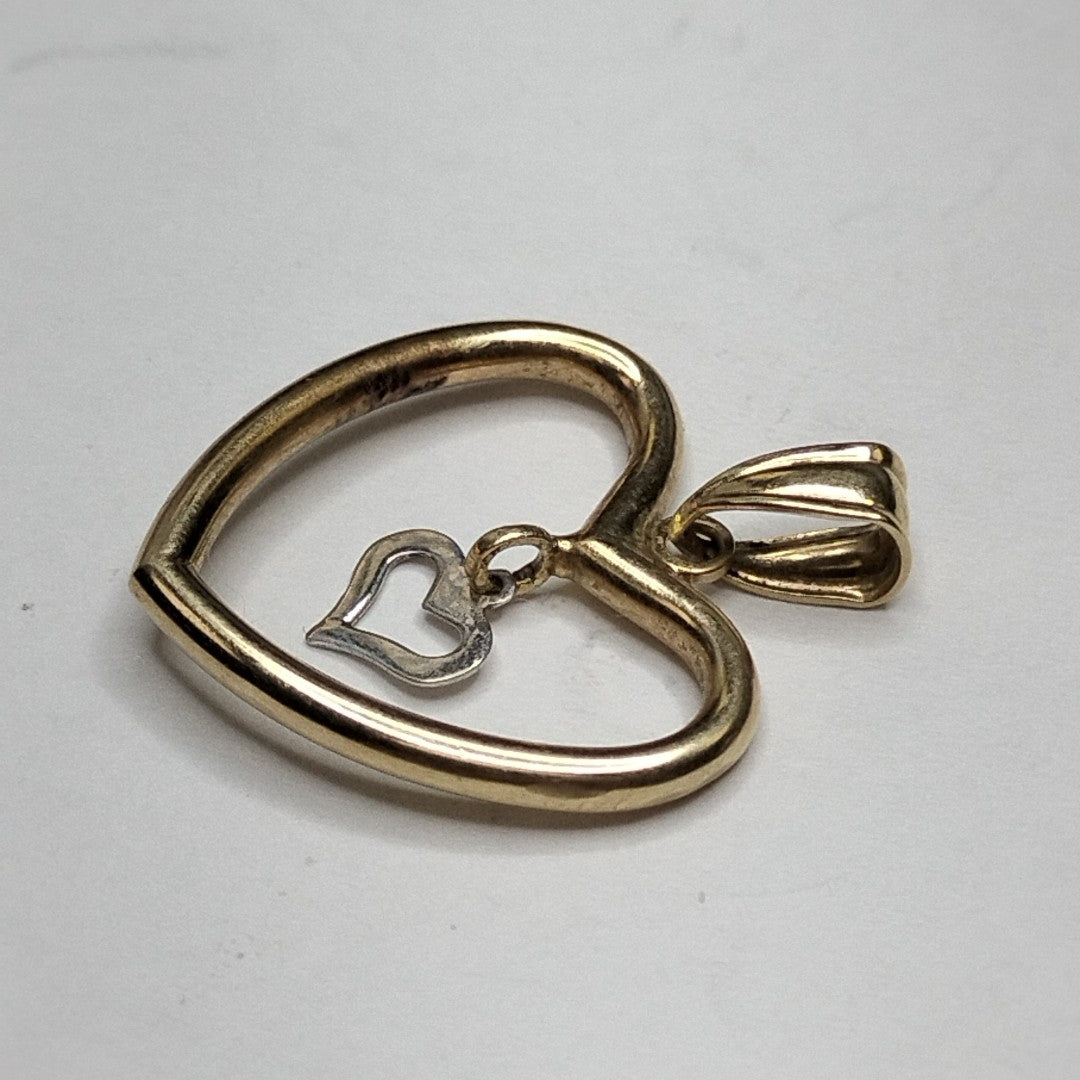 DIJE. ORO, ORO BLANCO. 14 K 1 GRMS (SEMINUEVO)