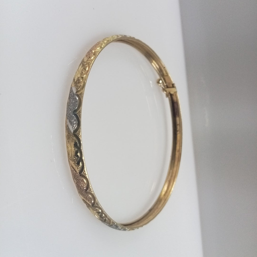 PULSERA RIGIDA. ORO COMBINADO. 14 K 7.3 GRMS (SEMINUEVO)