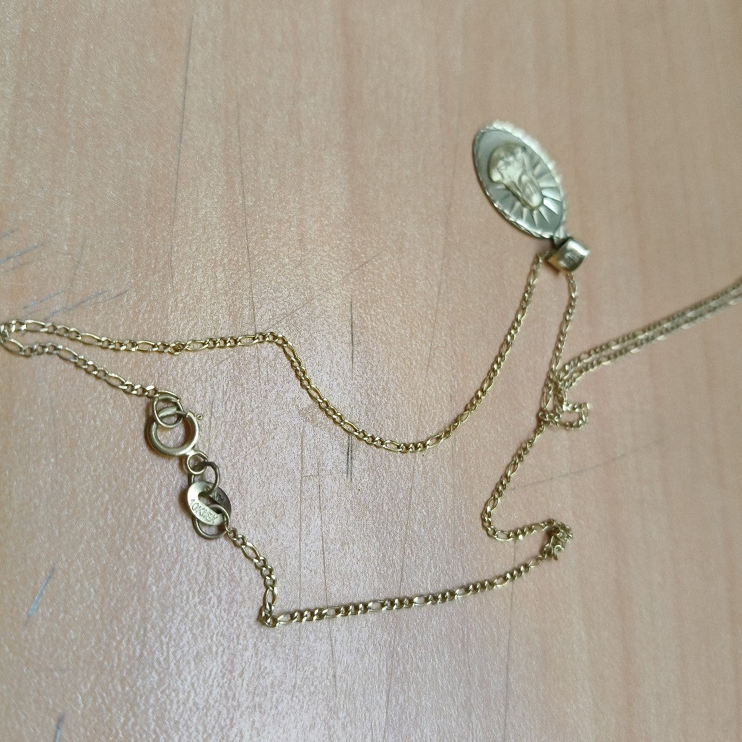 CADENA,MEDALLA RELIGIOSA ORO 10 K 2,30 GRMS (SEMINUEVO)