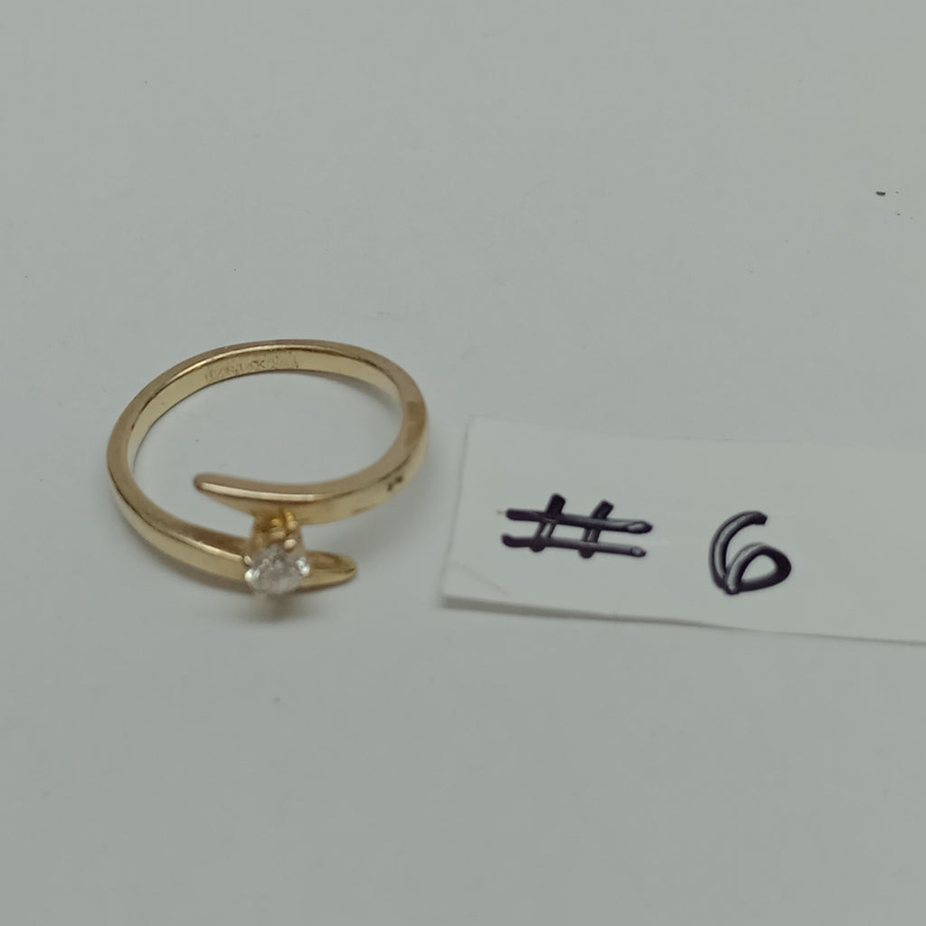 K1 2,50 GRMS 14 K ESPECIFICACIONES COMPLEMENTARIAS ANILLITO C UN DIAMTE 0.15 PTS (SEMINUEVO)