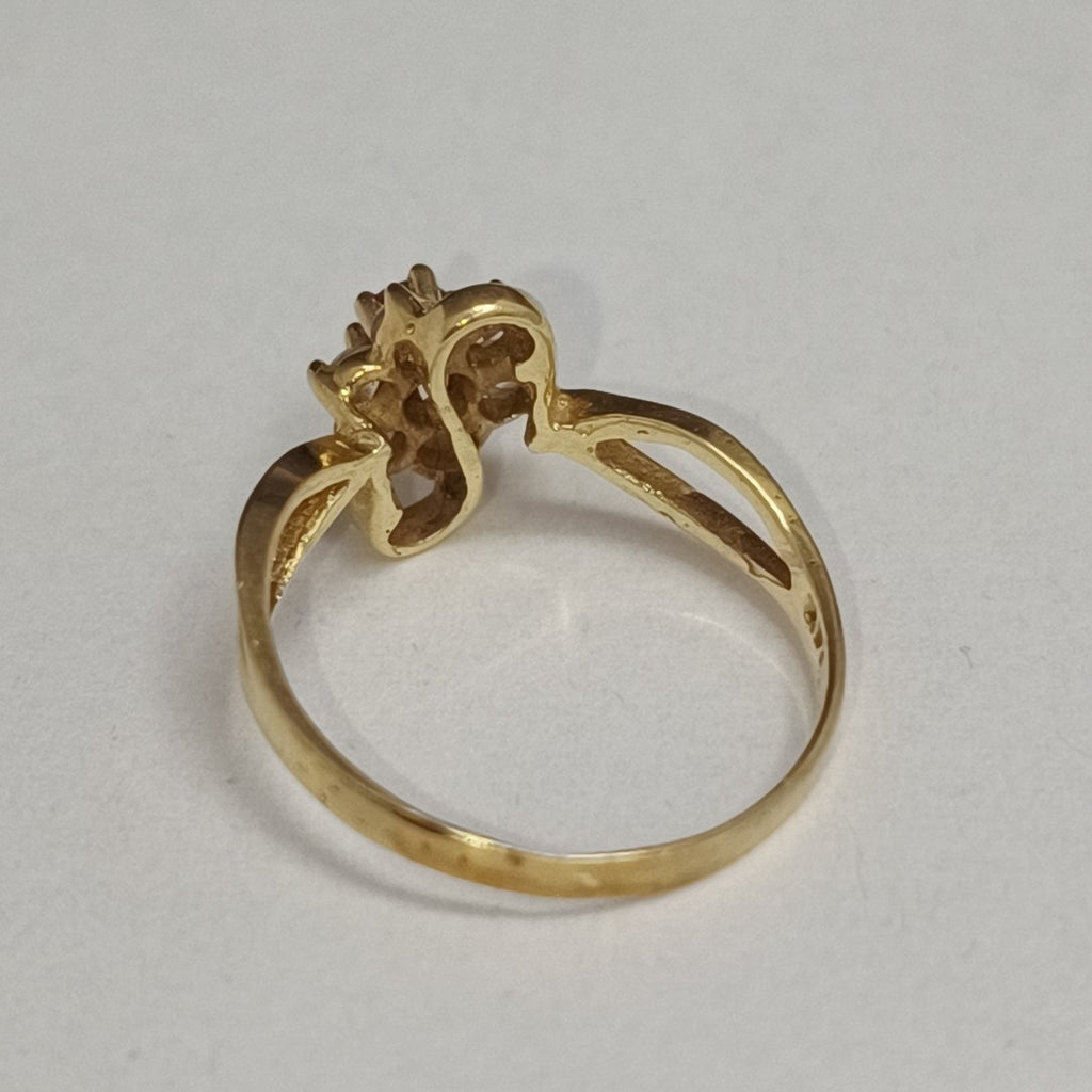 K1 1,80 GRMS 14 K ESPECIFICACIONES COMPLEMENTARIAS ANILLITO EN FORMA DE FLOR CON (SEMINUEVO)