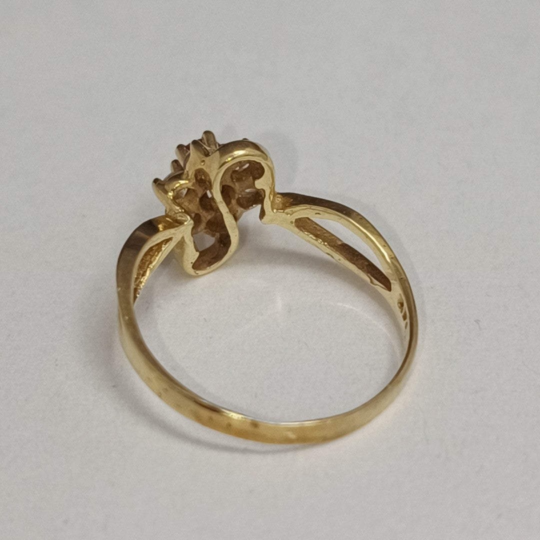 K1 1,80 GRMS 14 K ESPECIFICACIONES COMPLEMENTARIAS ANILLITO EN FORMA DE FLOR CON (SEMINUEVO)