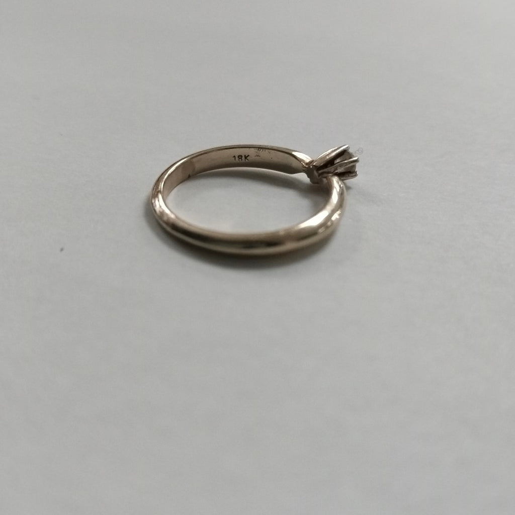 SOLITARIO ORO 18 K 3 GRMS (SEMINUEVO)