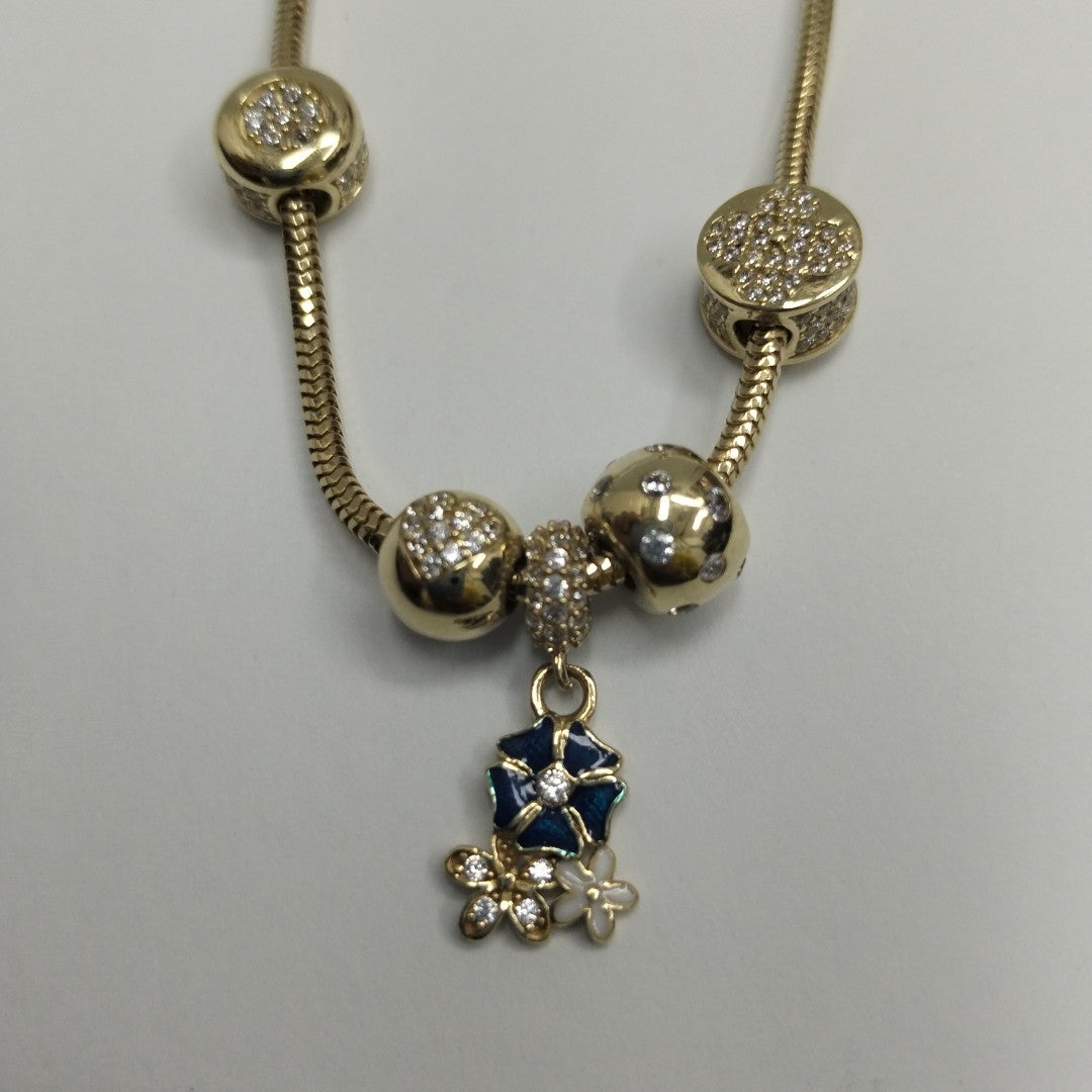 PULSERA CHARM ORO 14K 9.9 (NUEVO)