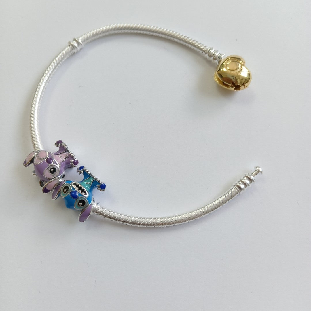 PULSERA TEJIDO ARTICULADA CON CHARMS PLATA .925 18 CM 19.1 GR (NUEVO)