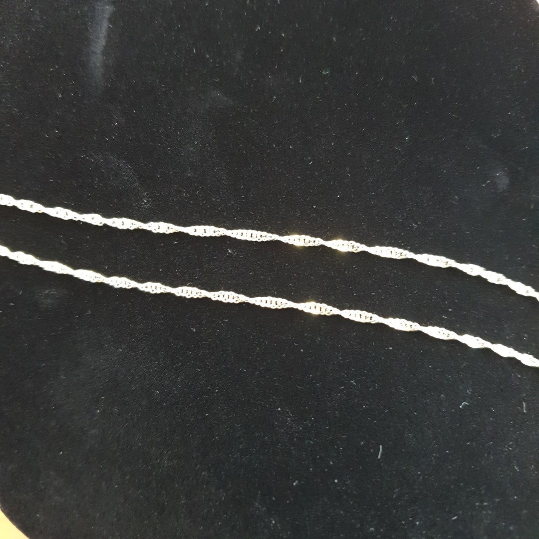 CADENAS TEJIDO MEDIO TORZAL ORO 10K 55 CM 2.5 GR (NUEVO)