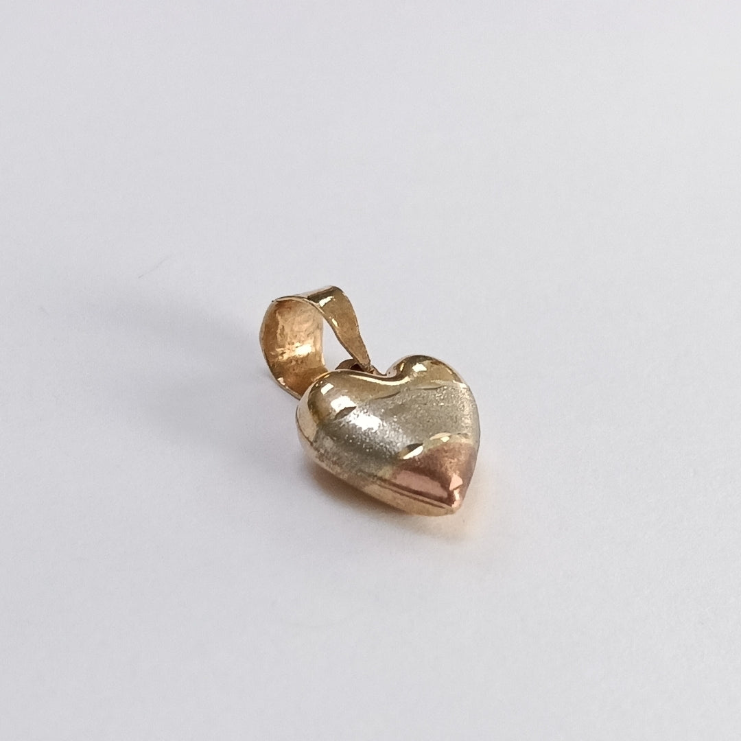 DIJE ORO, ORO COMBINADO 10 K 0.9 GRMS (SEMINUEVO)