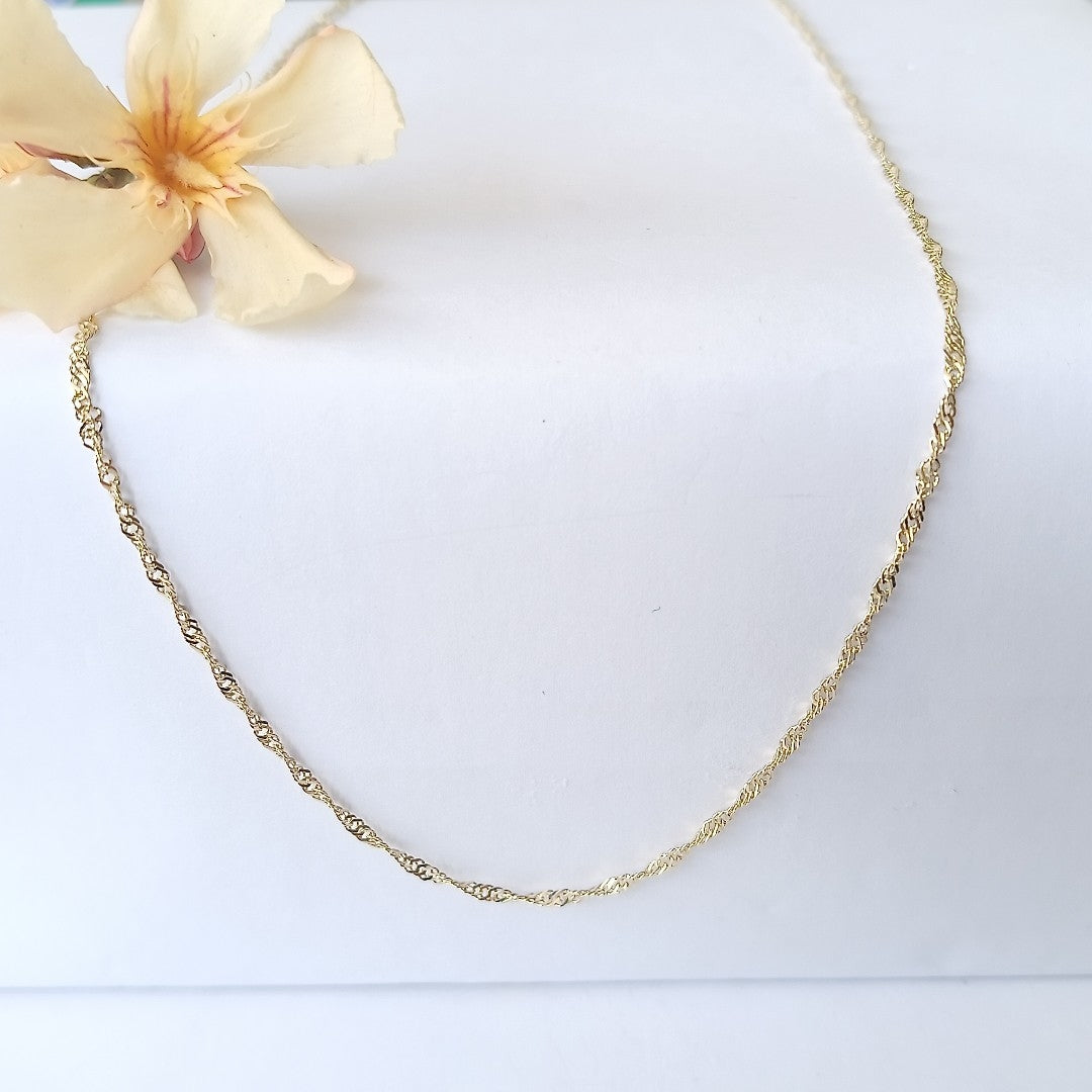 CADENAS TEJIDO MEDIO TORZAL ORO 10K 55 CM 2.5 GR (NUEVO)