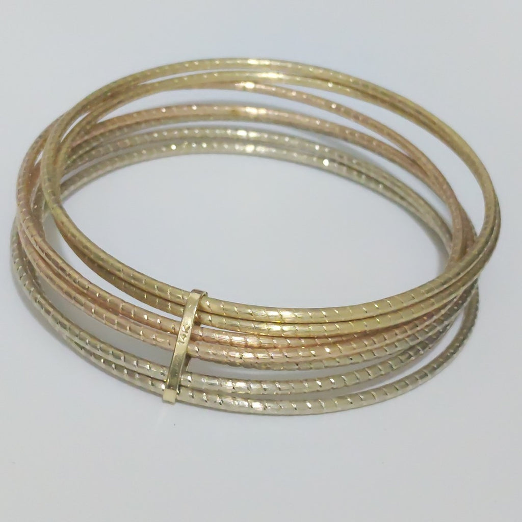 SEMANARIO DE PULSERAS ORO COMBINADO 14 K 27.8 GRMS (SEMINUEVO)