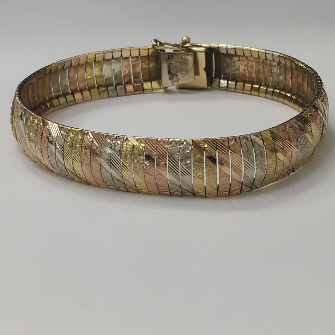PULSERA ORO COMBINADO 14 K 21.8 GRMS (SEMINUEVO)