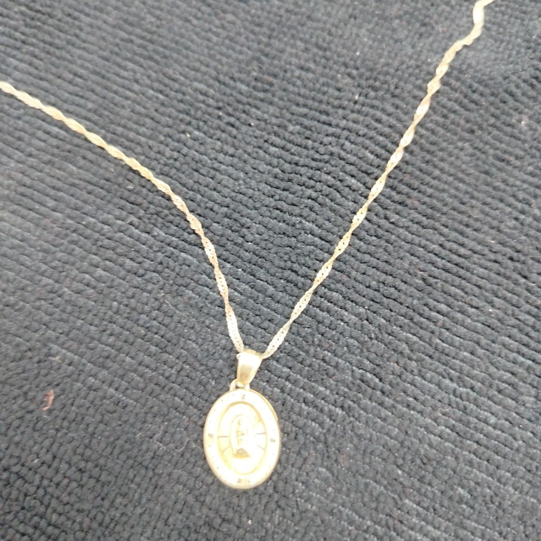CADENA, MEDALLA RELIGIOSA ORO COMBINADO 10 K 2.5 GRMS (SEMINUEVO)