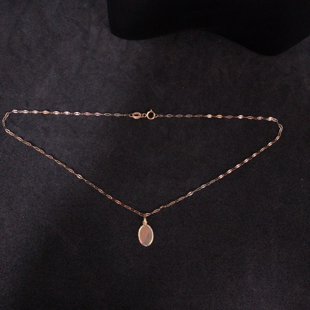 CADENA, MEDALLA RELIGIOSA ORO 10 K 1.2 GRMS (SEMINUEVO)