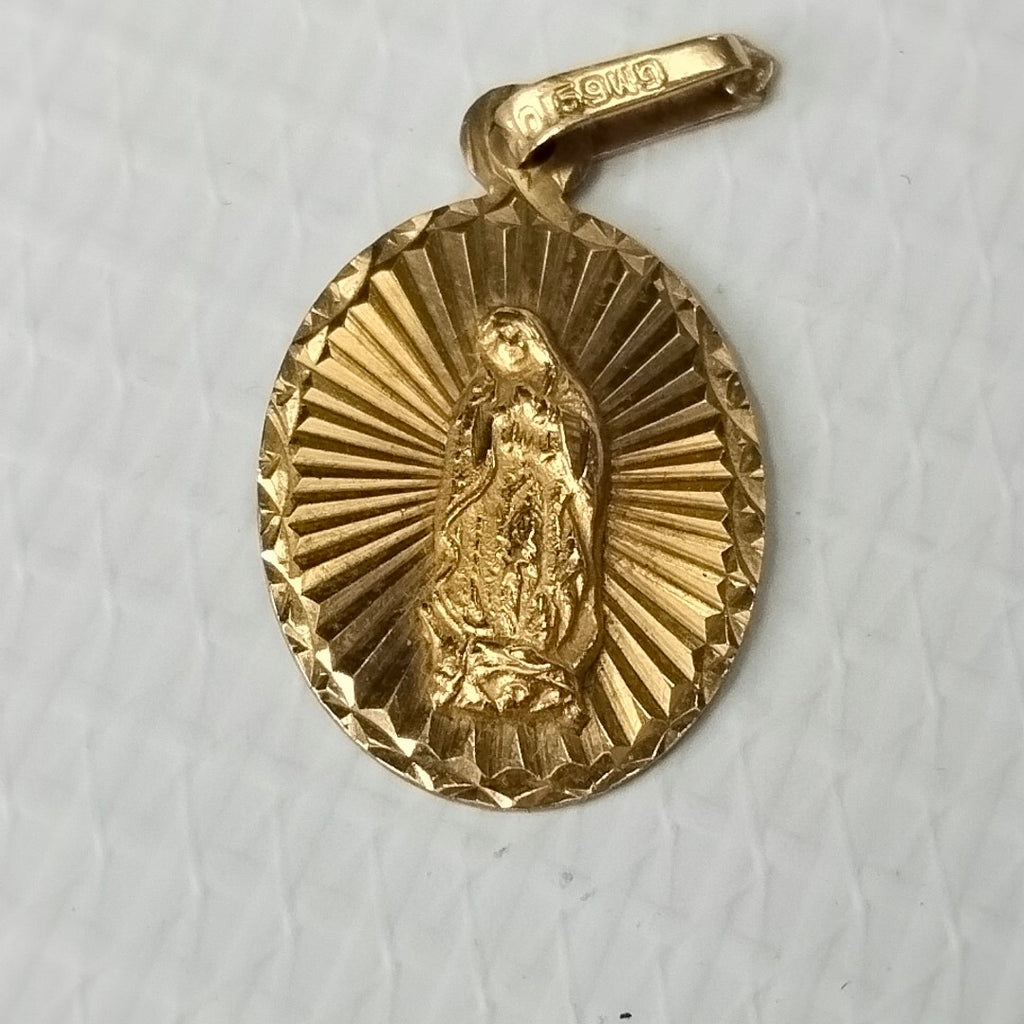 MEDALLA RELIGIOSA ORO 10 K 1.4 GRMS (SEMINUEVO)
