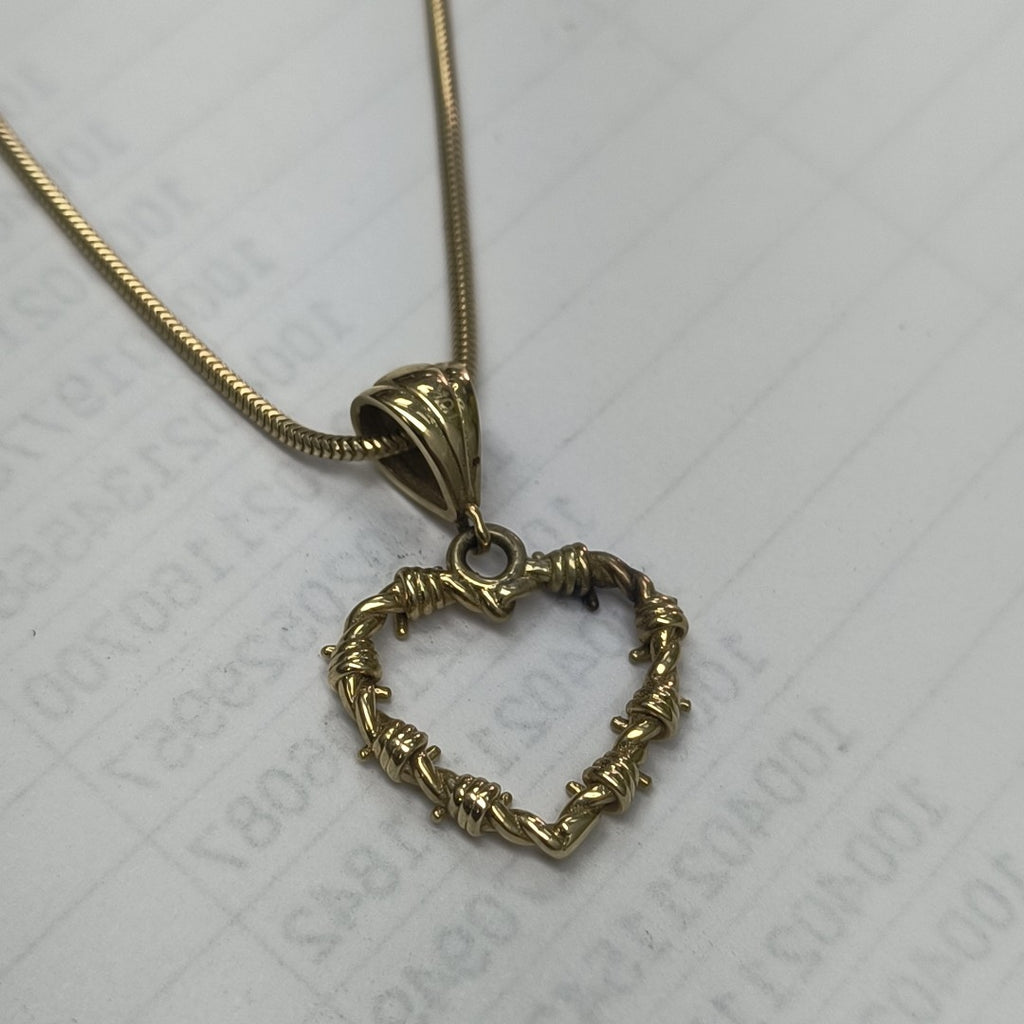 CADENA, DIJE ORO 10 K 4.5 GRMS (SEMINUEVO)