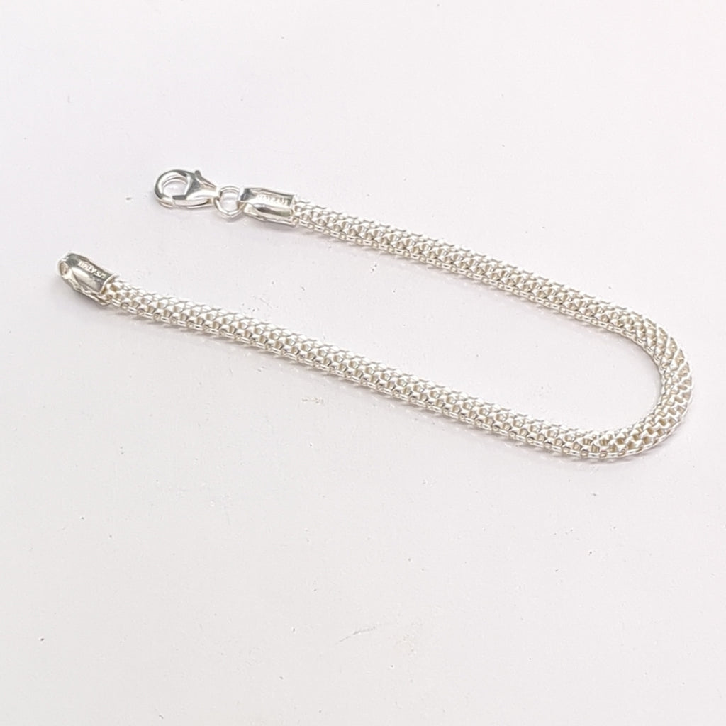 PULSERA TEJIDO ESPECIAL PLATA .925 18 CM 4.9 GR (NUEVO)